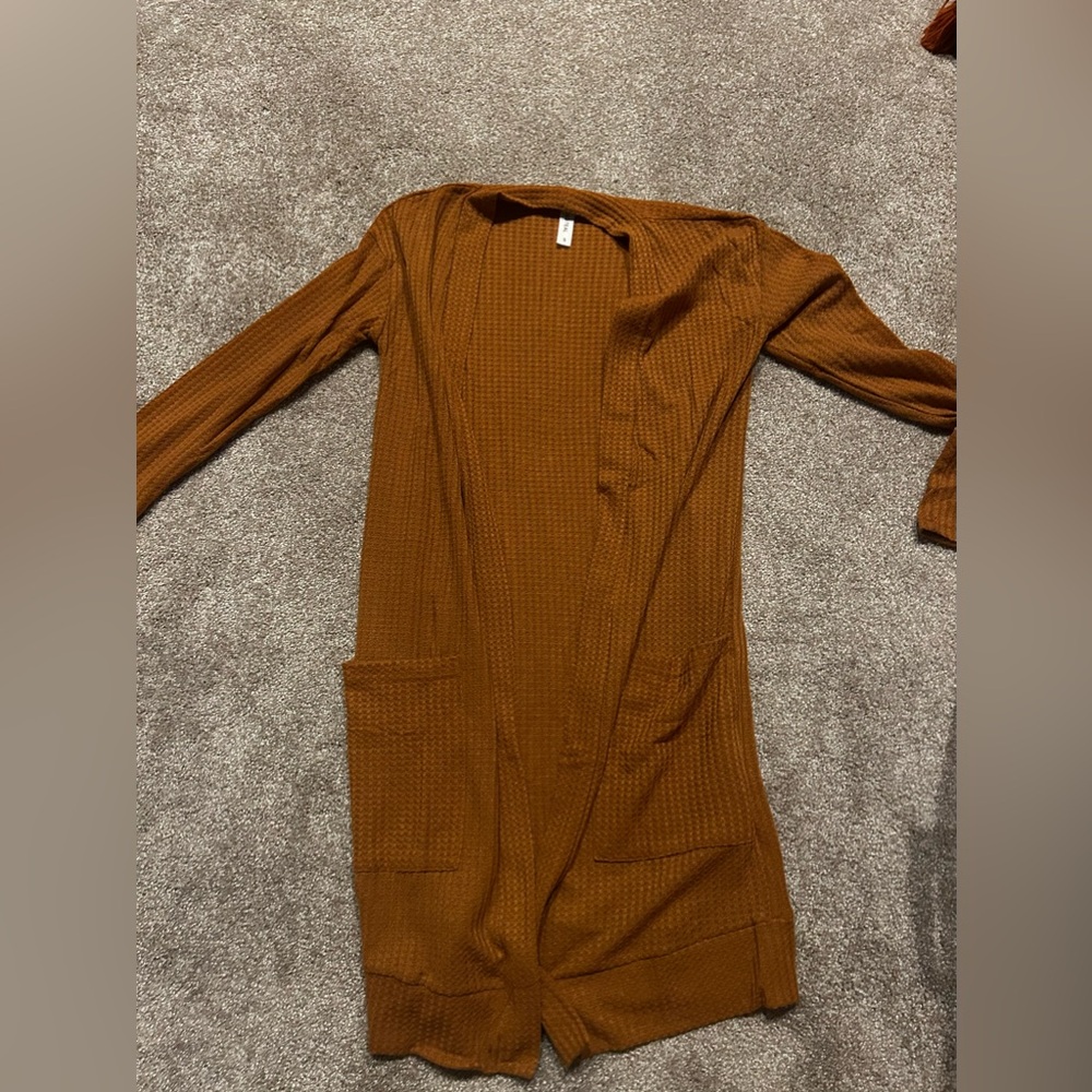 Burnt orange waffle cardigan.